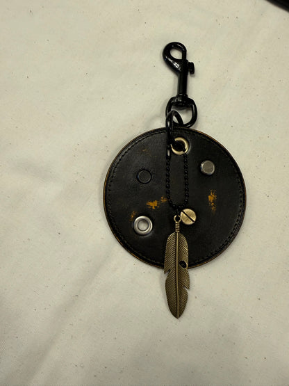 Repurposed Coach Coaster Bag Charm with Rivets and Feather