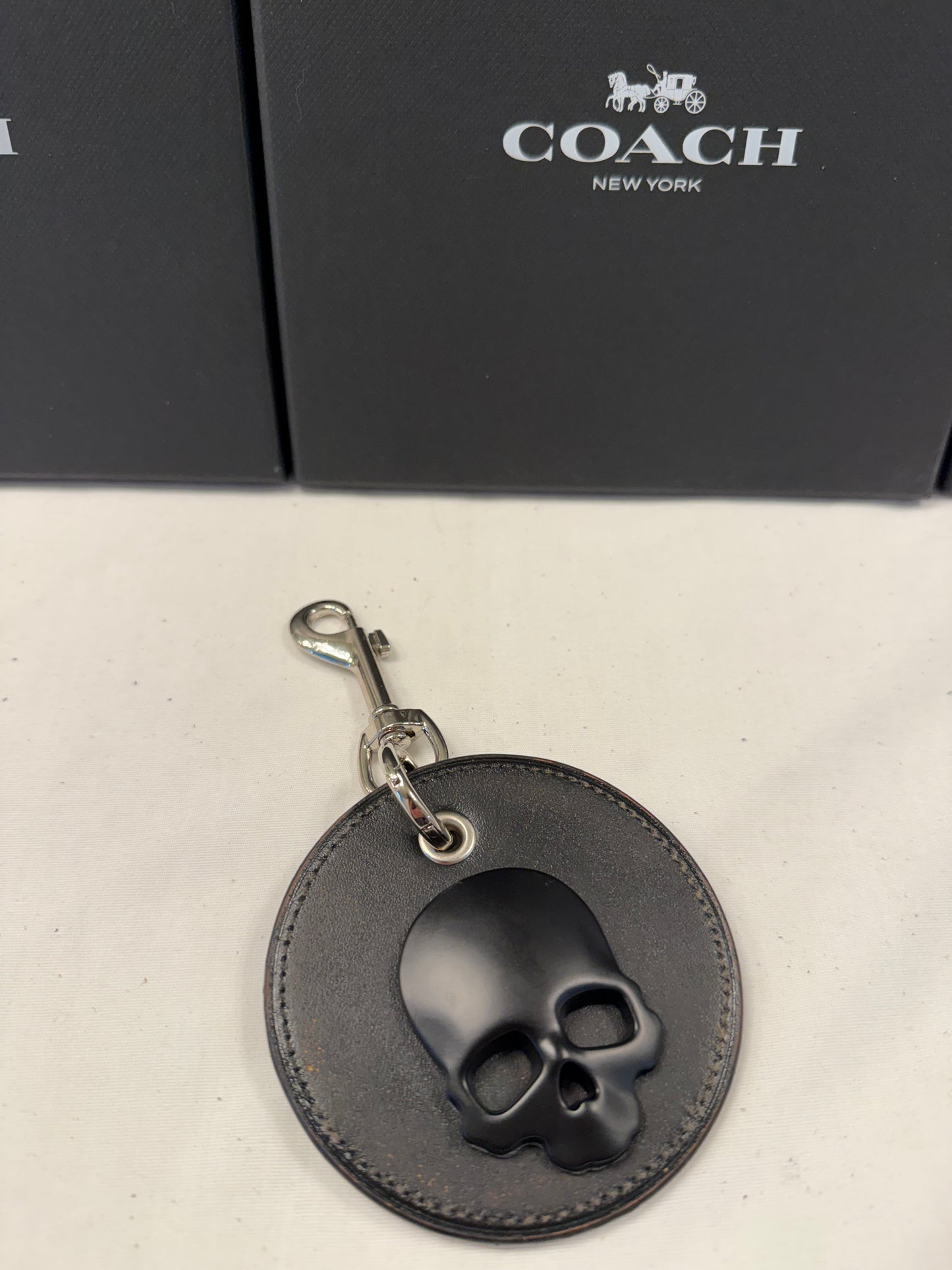 Repurposed Coach Coaster Bag Charm with Black Skull