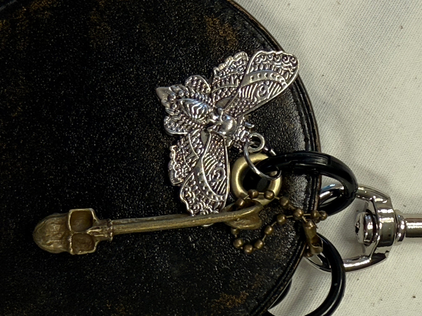 Repurposed Coach Coaster Bag Charm with Skull Moth Charms