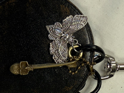 Repurposed Coach Coaster Bag Charm with Skull Moth Charms