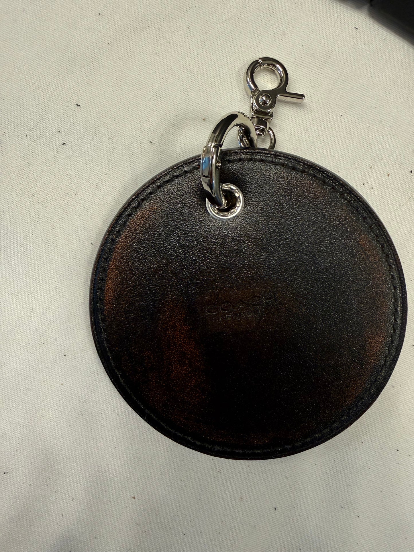 Repurposed Coach Coaster Bag Charm with Skull and Moth Charms