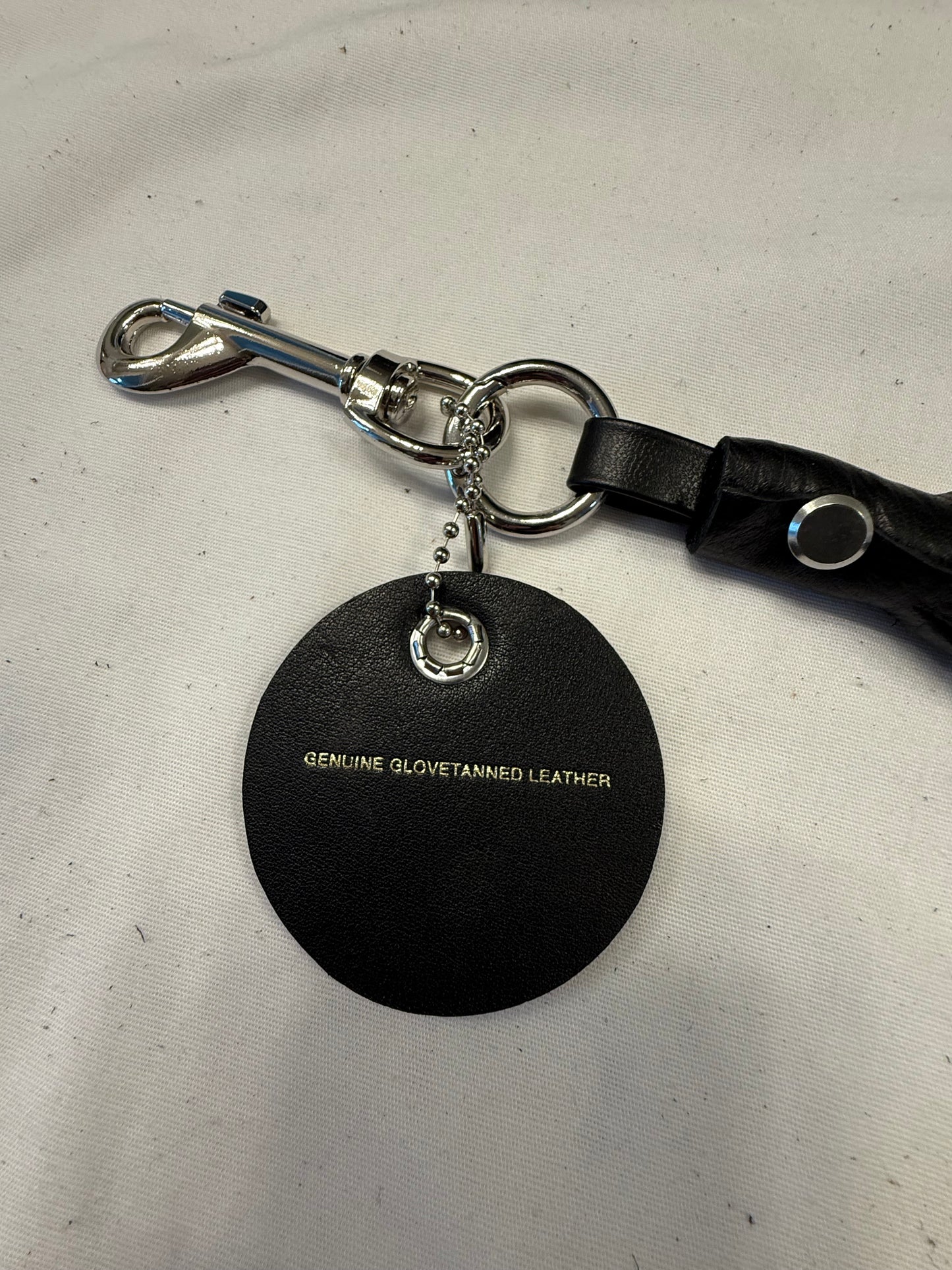 Handmade Pebbled Leather Tassel & Repurposed Coach Charm