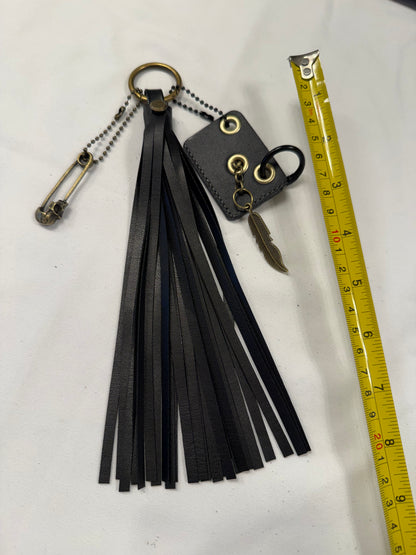 Vegan Leather Handmade Tassel with Repurposed Coach Tic Tac Toe Piece Riveted Charm and Skull Safety Pin Antique Brass Bag Charm