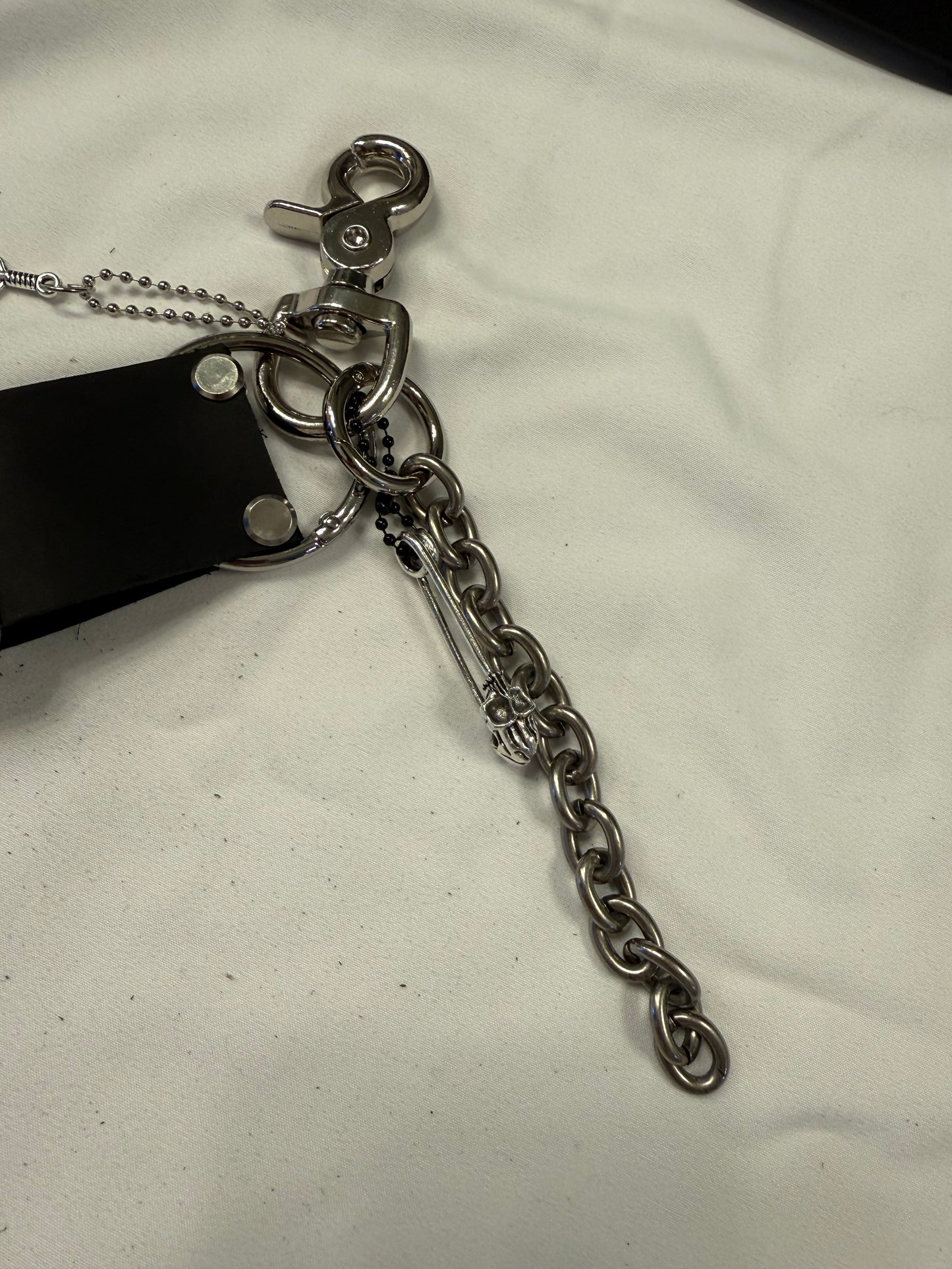 Repurposed Silver Buckle with Saddle Bag Charm Cluster with Feather and Chain