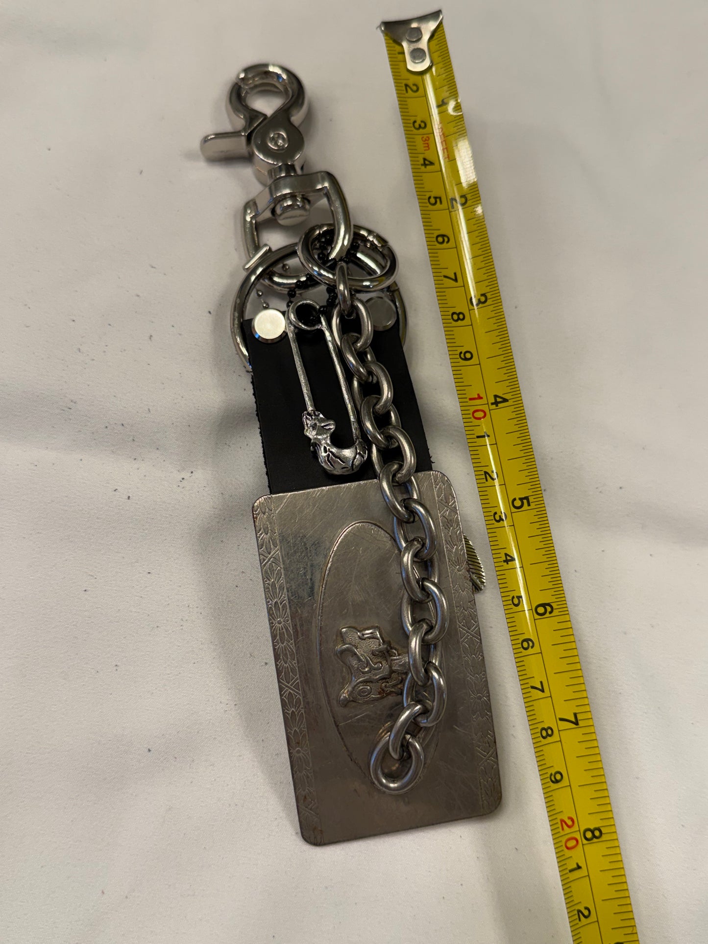 Repurposed Silver Buckle with Saddle Bag Charm Cluster with Feather and Chain