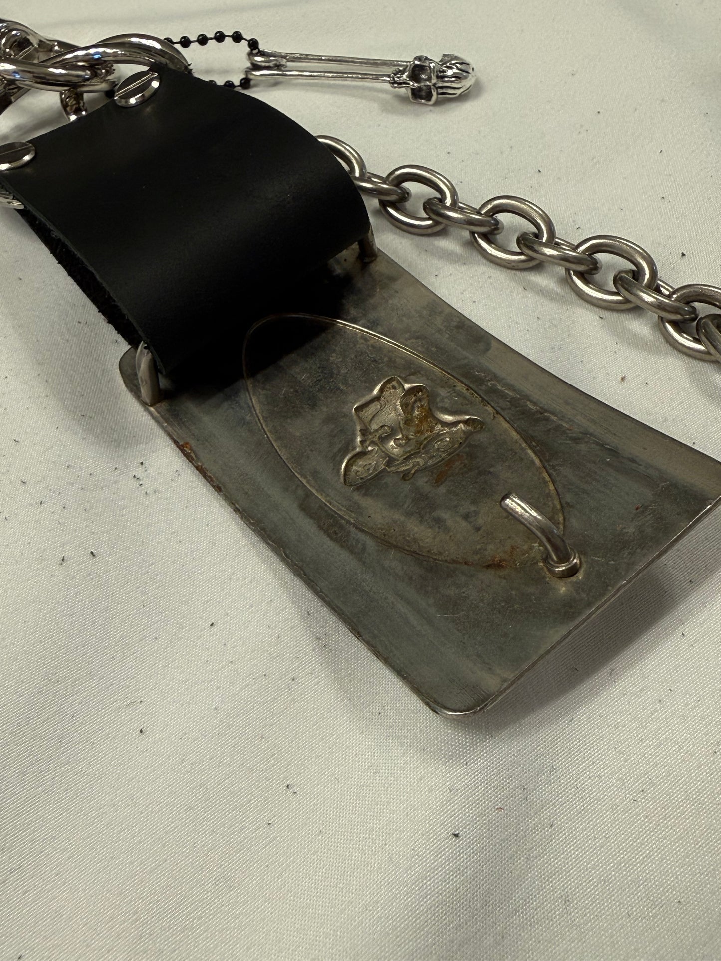 Repurposed Silver Buckle with Saddle Bag Charm Cluster with Feather and Chain