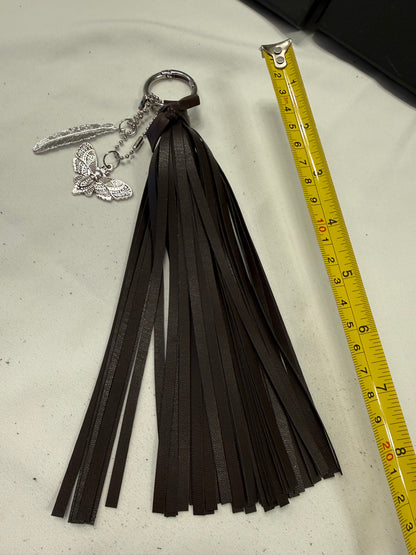 Vegan Leather Handmade Tassel in Dark Maple with Silver Tone Hardware Feather and Skull Moth Bag Charm