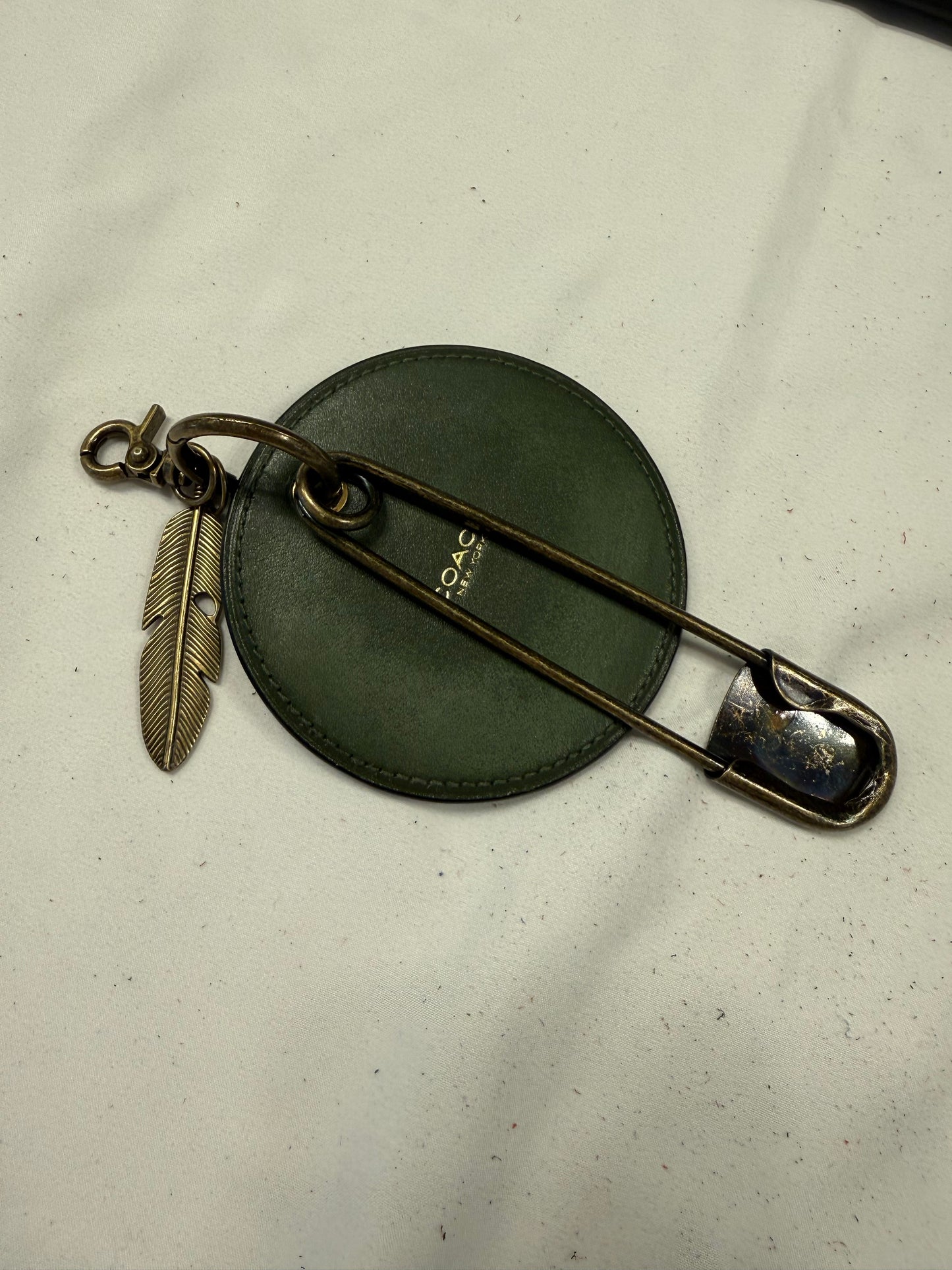 Repurposed Coach Olive Coaster Distressed with Feather & XL Safety Pin Bag Charm