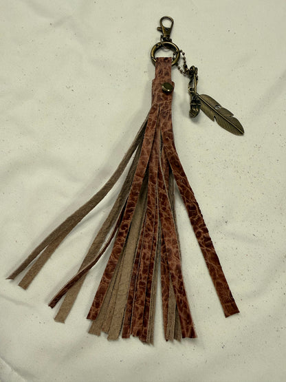 Hand cut Leather Brown Embossed Tassel with Skull Safety Pin and Feather Charm
