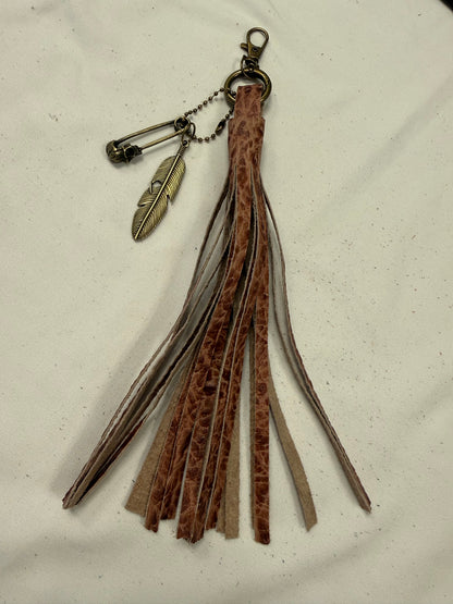 Hand cut Leather Brown Embossed Tassel with Skull Safety Pin and Feather Charm