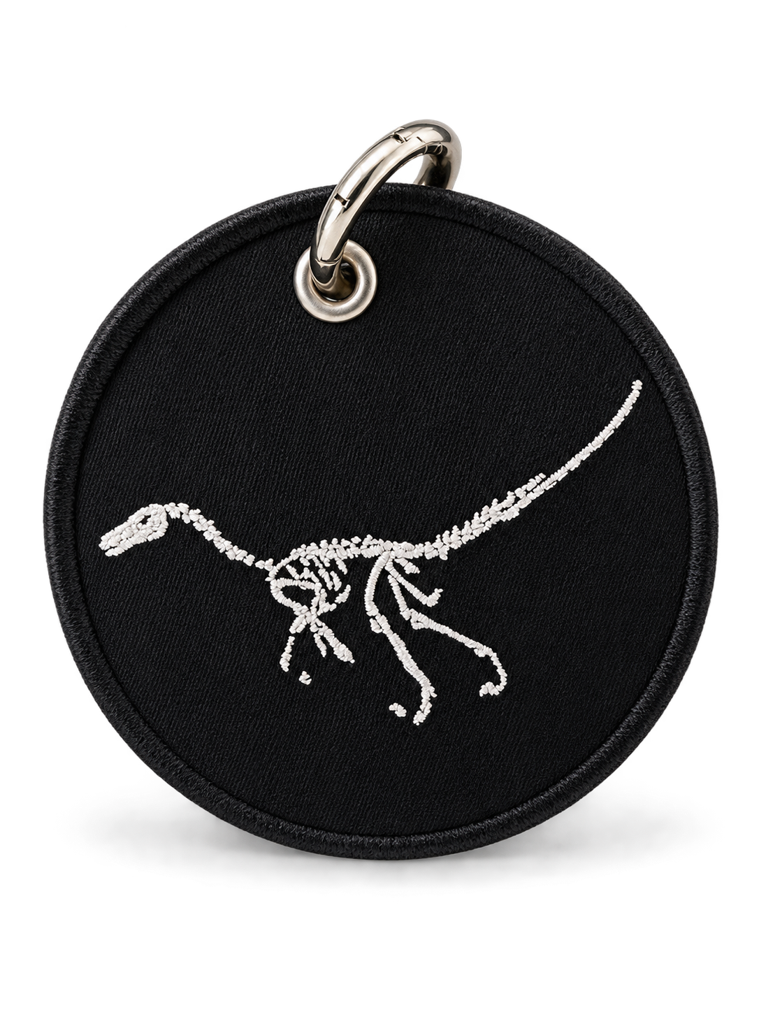 Dinosaur Skeleton Patch on a Piece of Repurposed Coach Handbag Bag Charm
